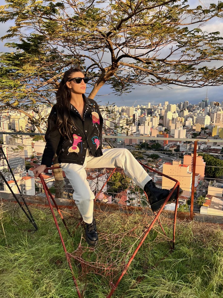 Embroidered jacket above the city